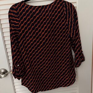 41 Hawthorn Navy and Orange Zigzag Blouse with pearl sleeve detail